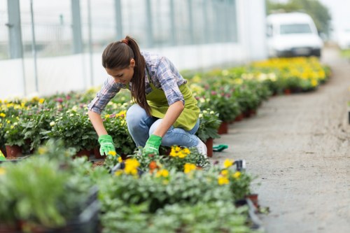 Team members preparing equipment before starting garden maintenance